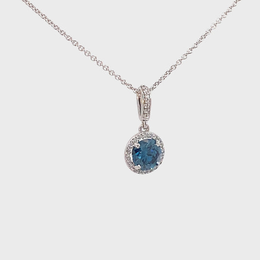 Lab-created Fancy Vivid Blue diamond halo pendant