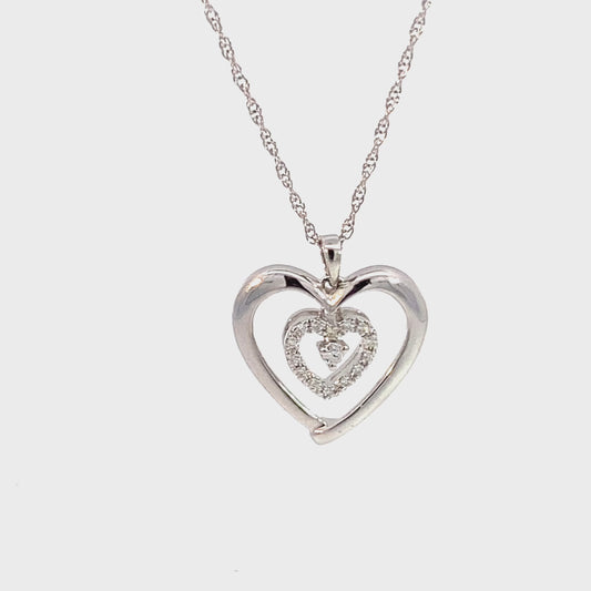 14k white gold double heart pendant with natural diamonds